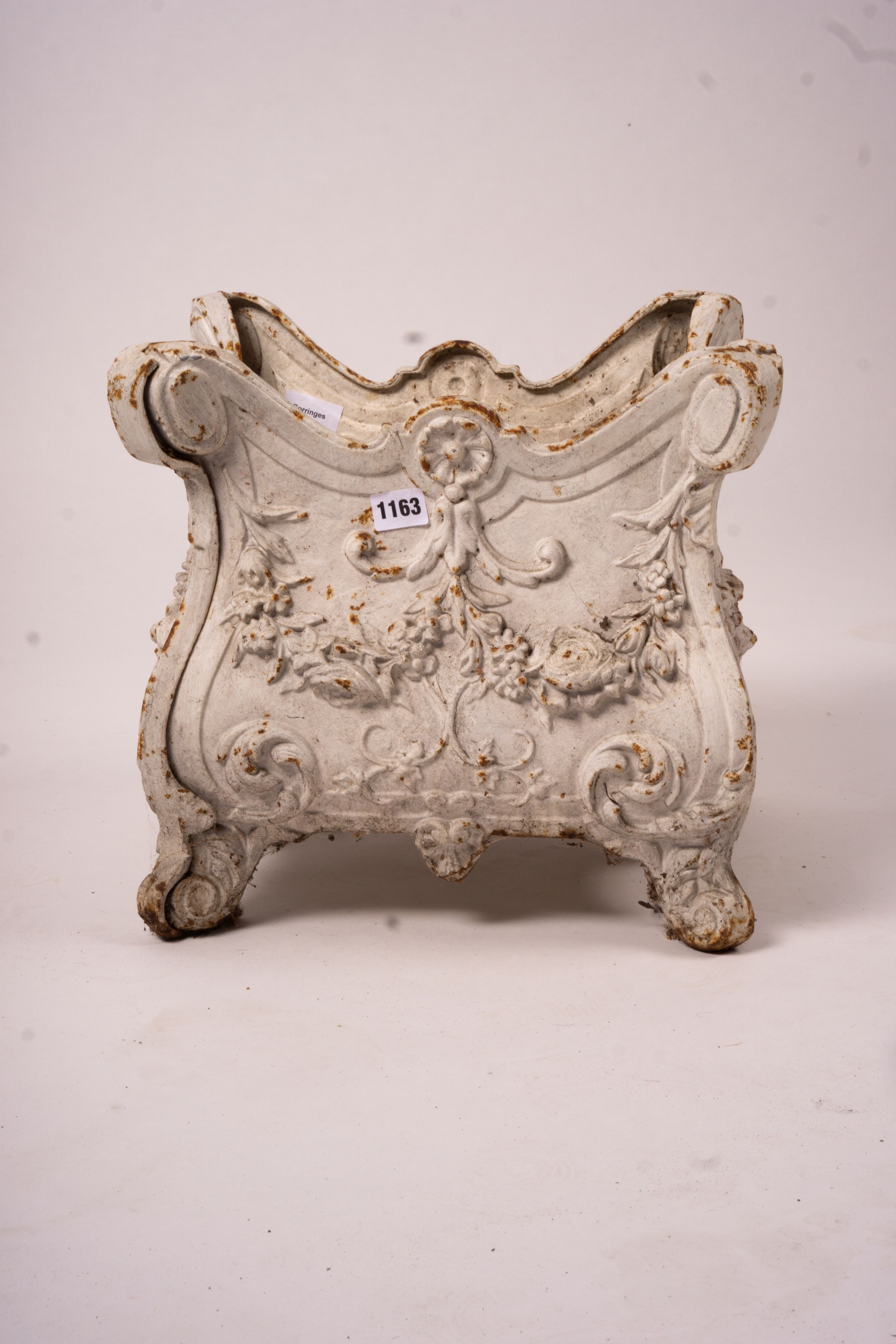 A Victorian style square cast iron jardiniere, width 38cm, height 34cm